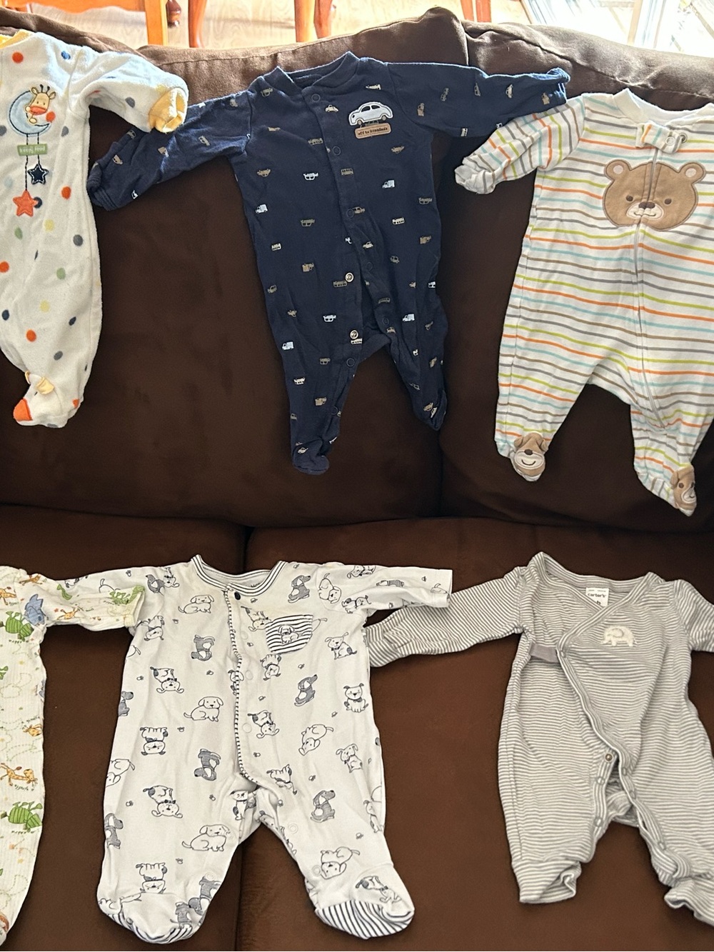 9 Newborn footie pajamas (good/fair)